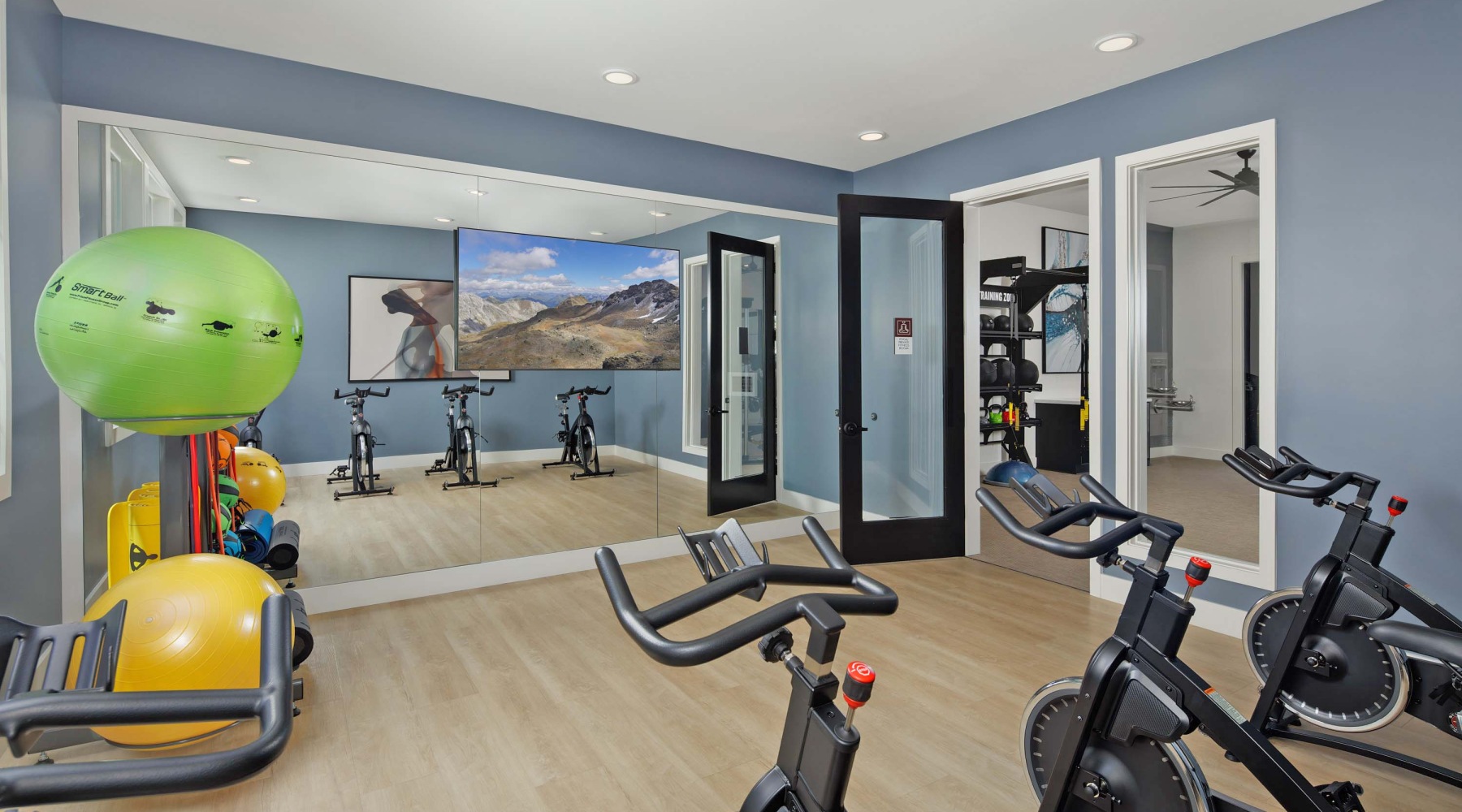 a room with bikes and a balloon